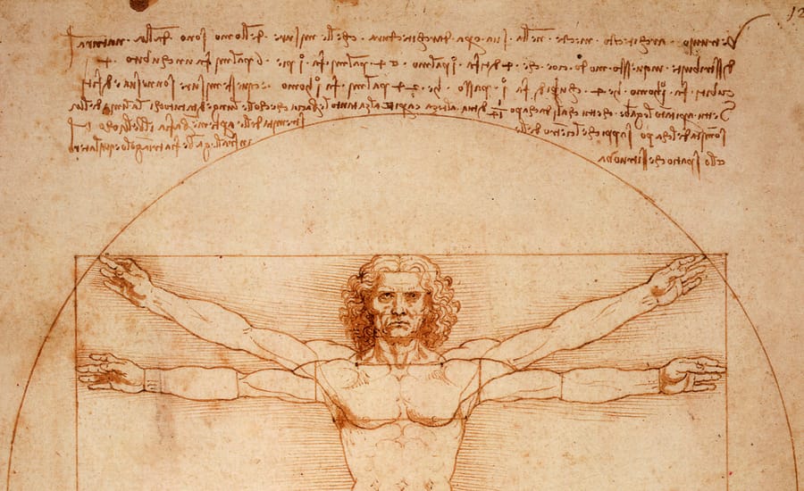 Detail of the Vitruvian Man by Leonardo da Vinci: a figure with outstretched arms inscribed in a square and circle, beneath lines of mirror-written notes on proportion.